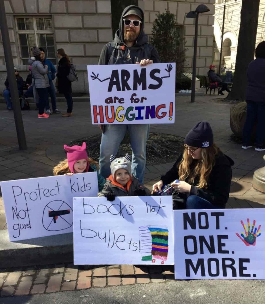 The Greer Family with thier signs